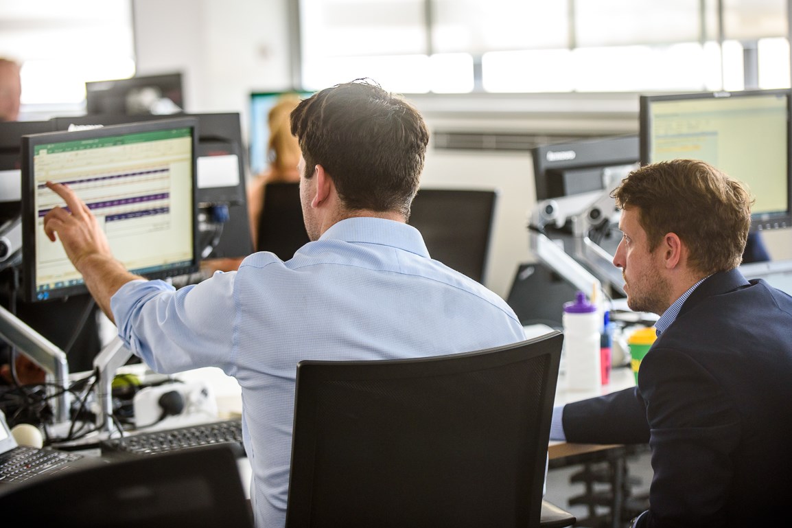 Two men at computer