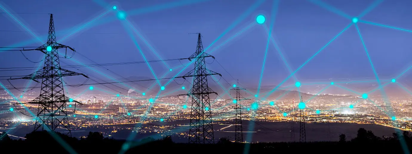 An photo of electricity pylons, taken at dusk, with overlaid imagery to imply connectivity